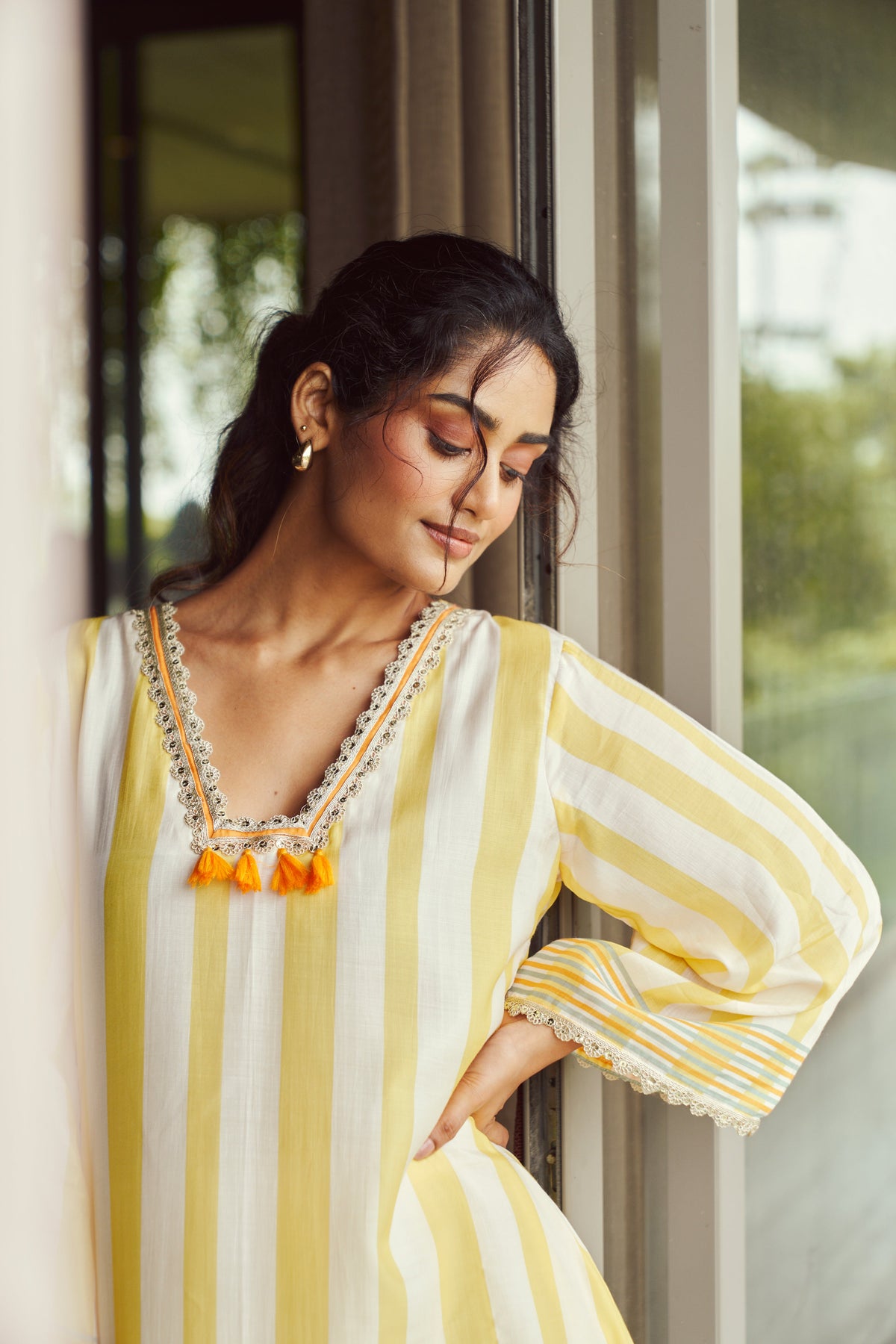 Yellow Striped Kurta with Orange Tassels
