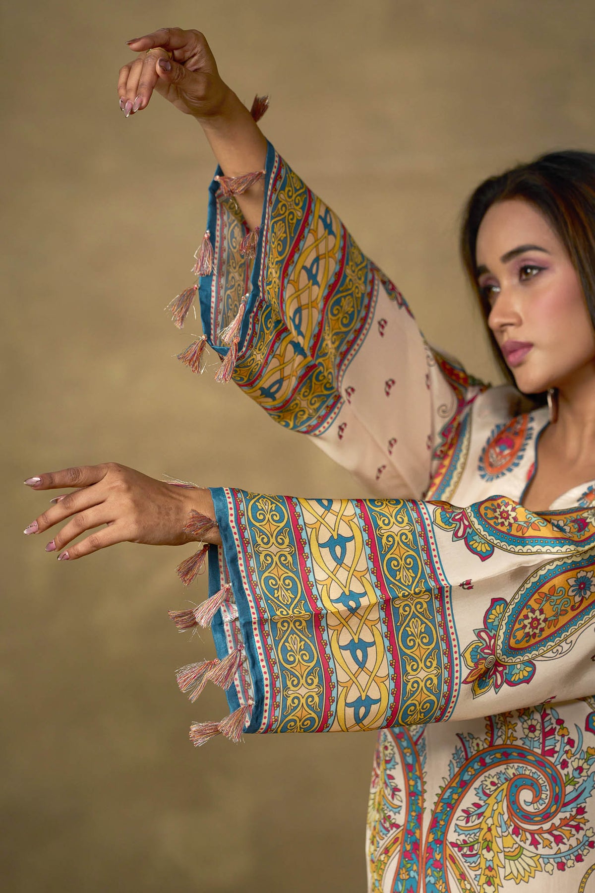 Ivory viscose kurta flared sleeve with printed border and tassel detail