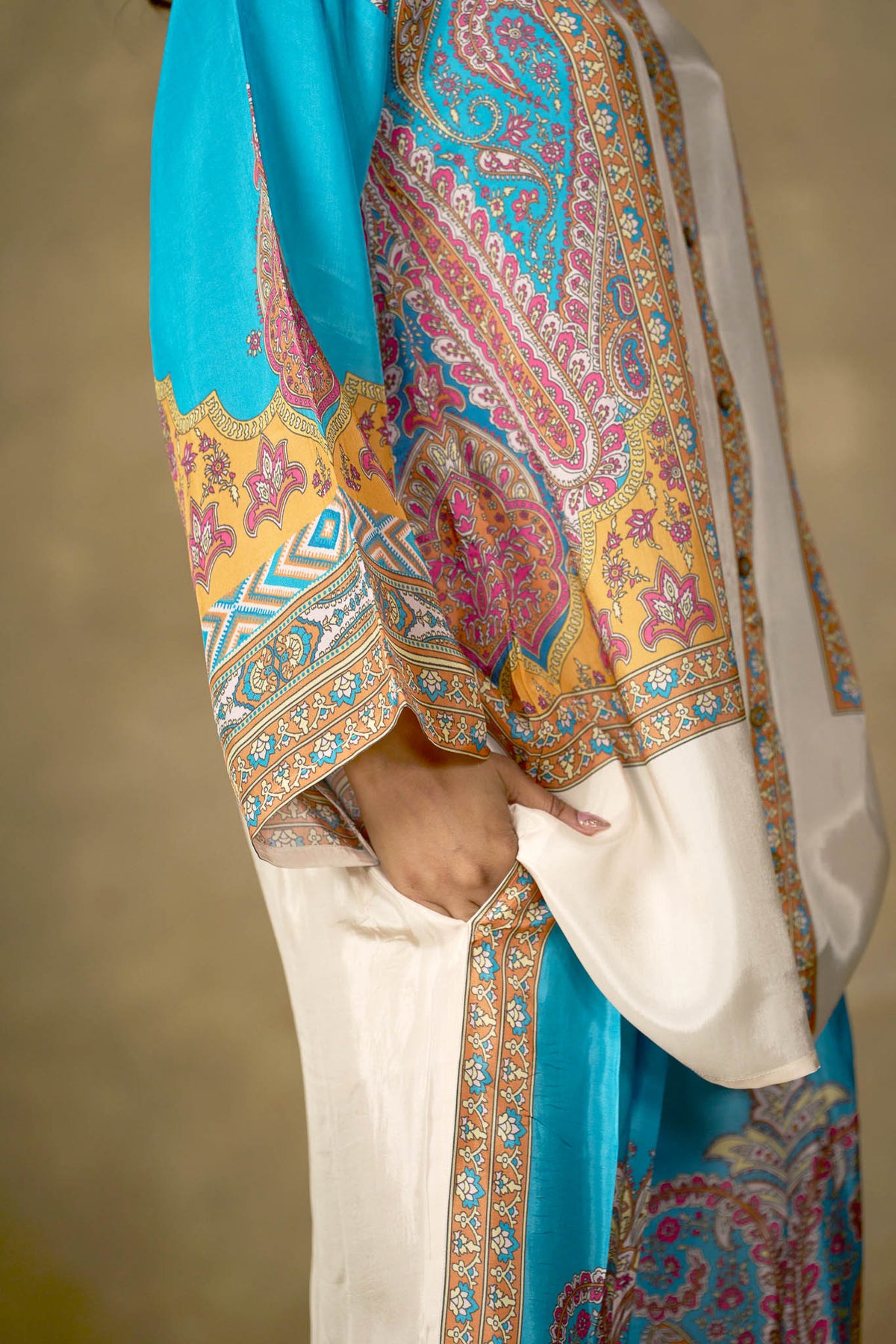 Turquoise paisley viscose tunic sleeve and border detail
