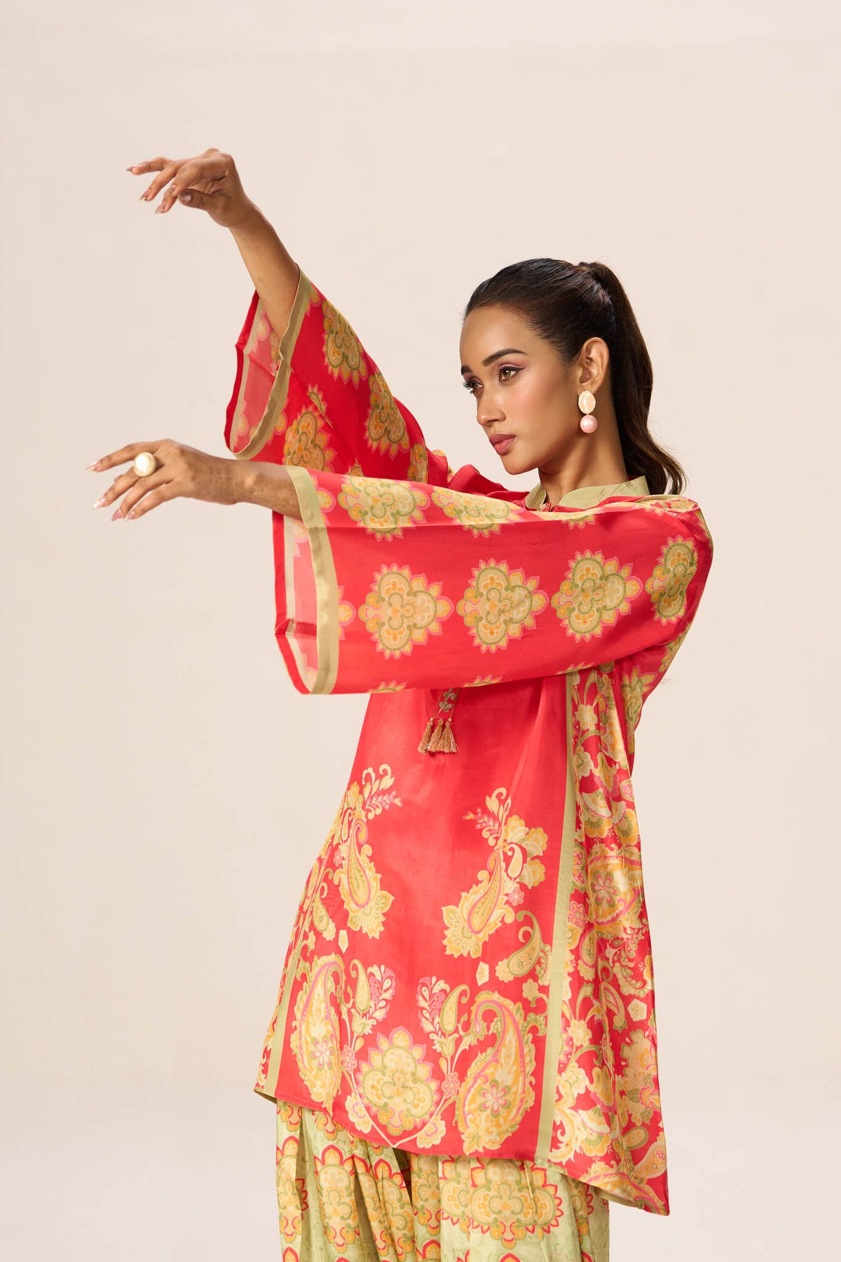 Coral viscose co-ord set sleeve and print detail