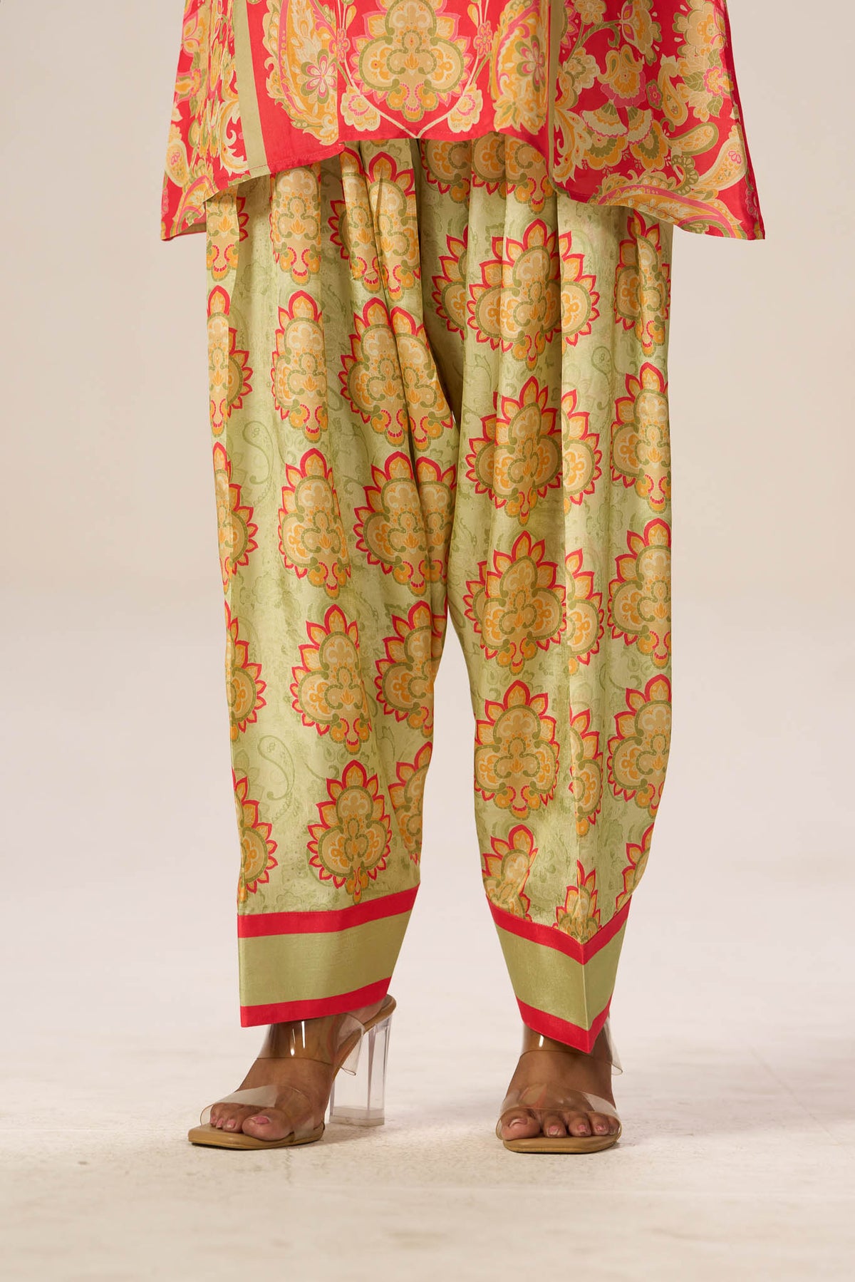 Olive printed viscose pants hem and border detail
