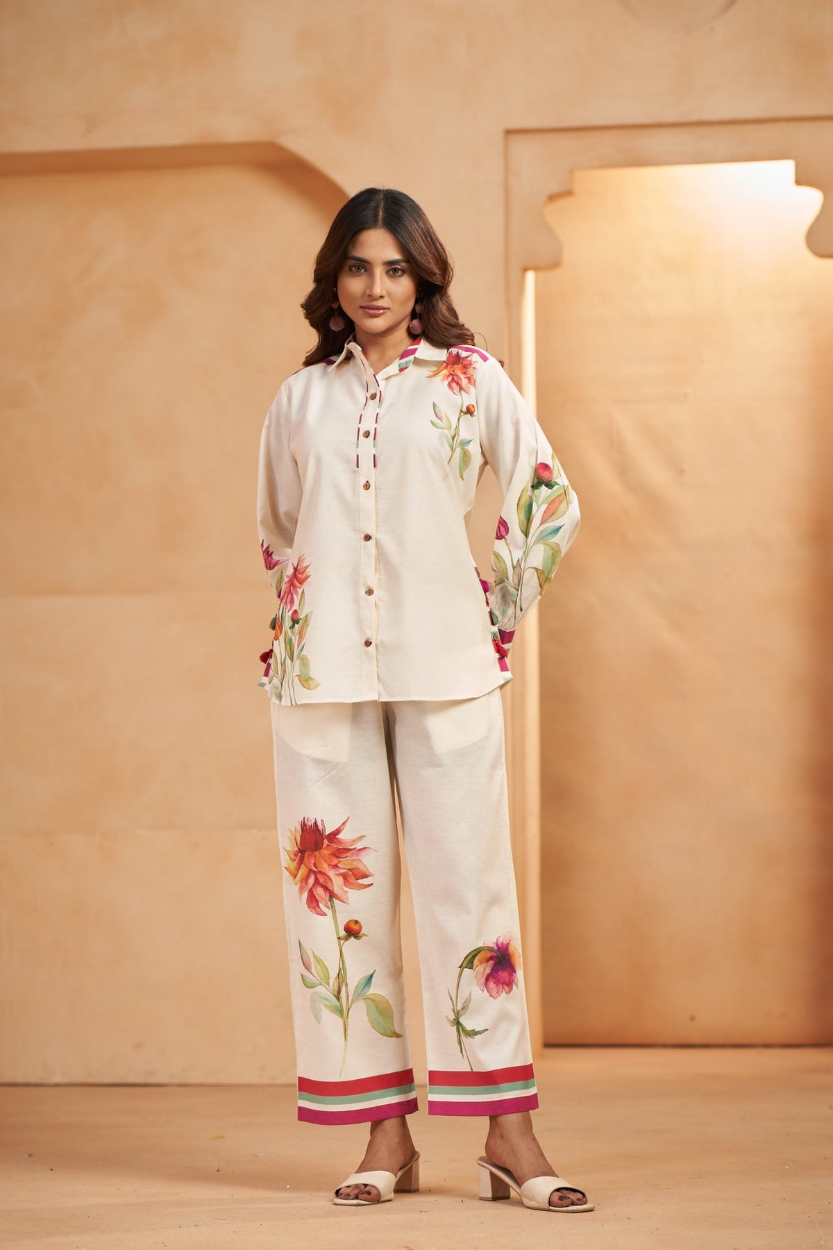 Woman wearing a floral linen outfit 