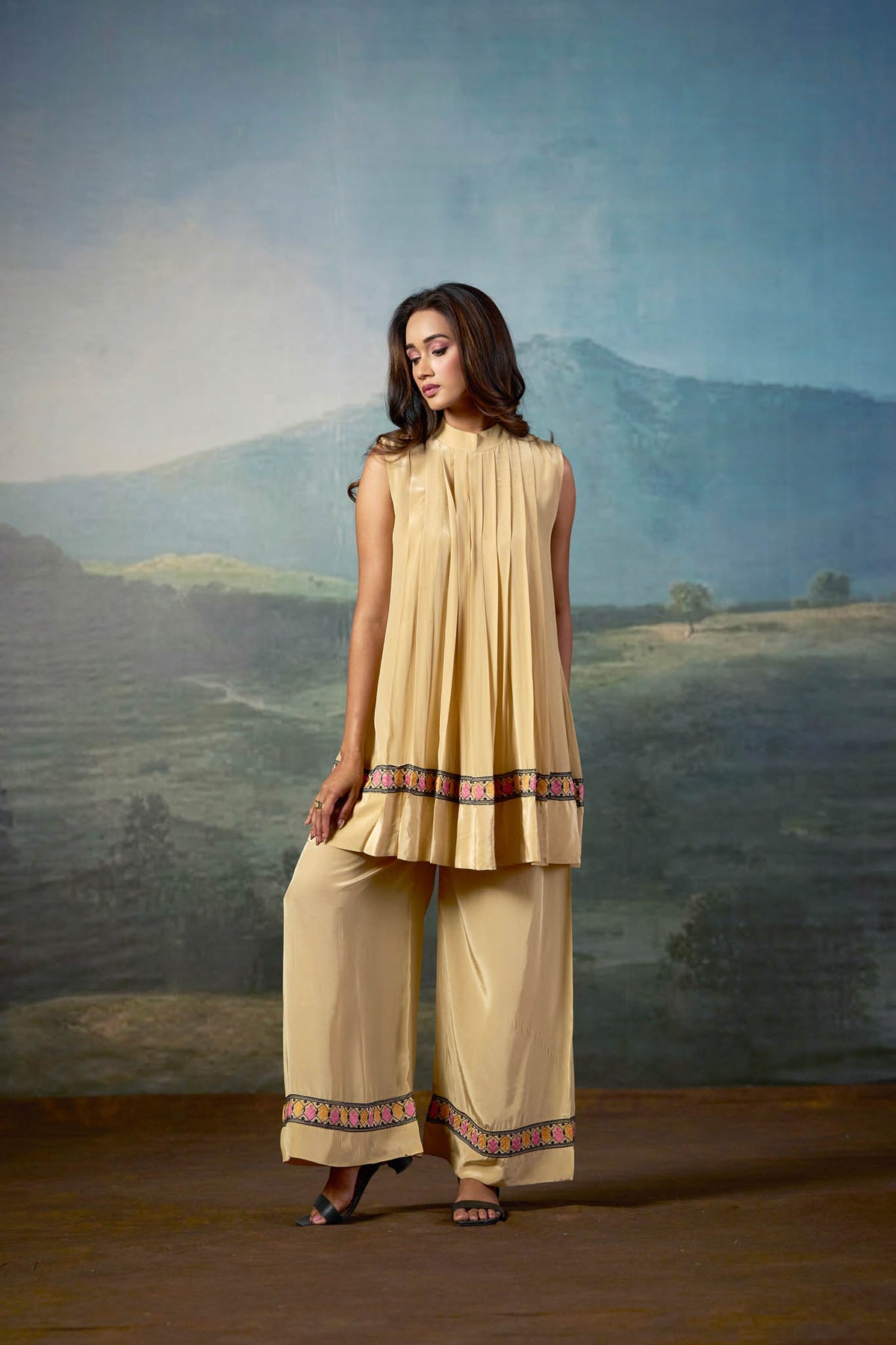Beige Pleated Sleeveless Tunic Pant Set with Embroidered Border